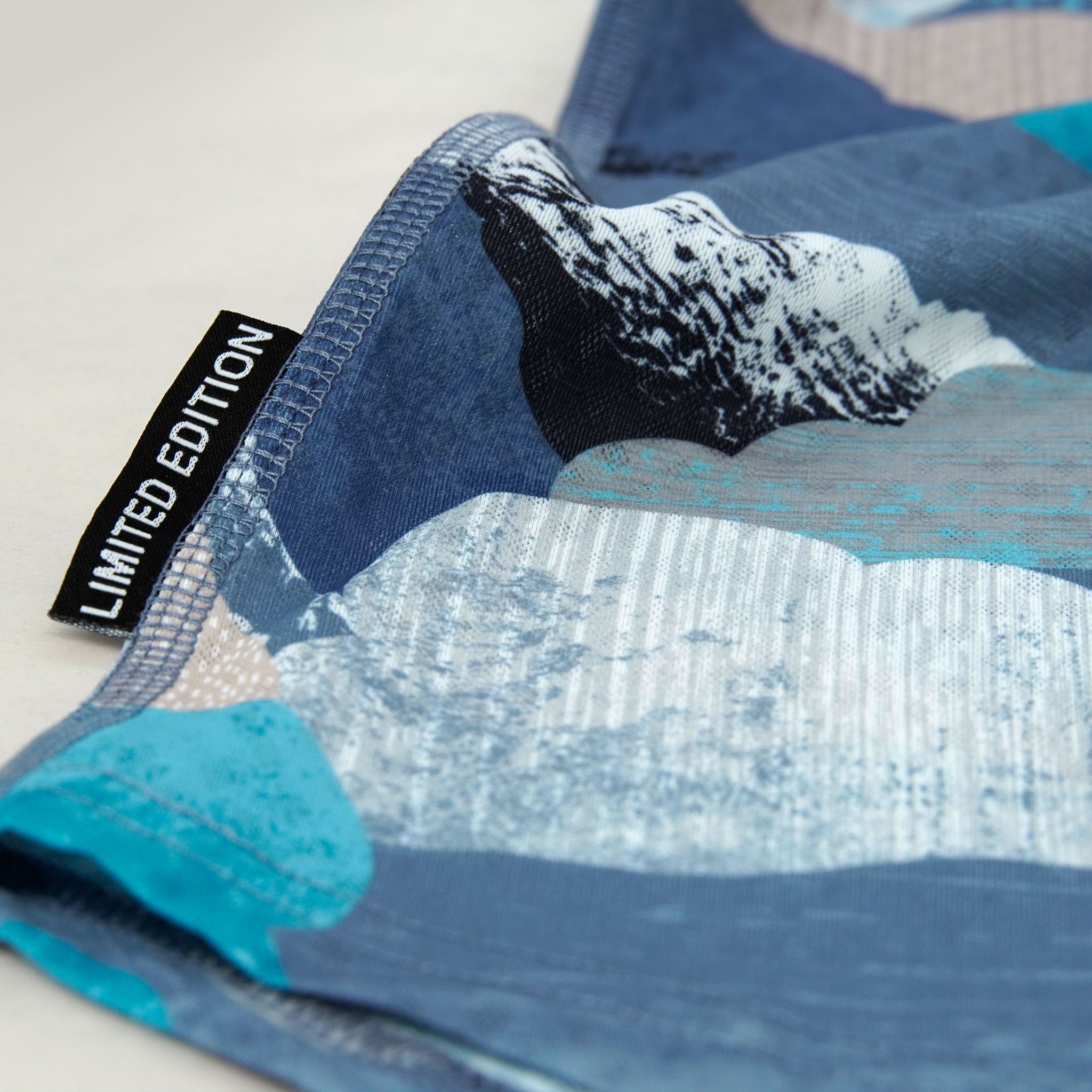 Close-up of cloudmaker fabric by loose line with a 'Limited Edition' tag.